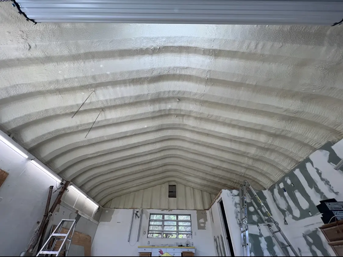 Spray polyurethane foam applied to the underside of a metal roof deck in Union Park